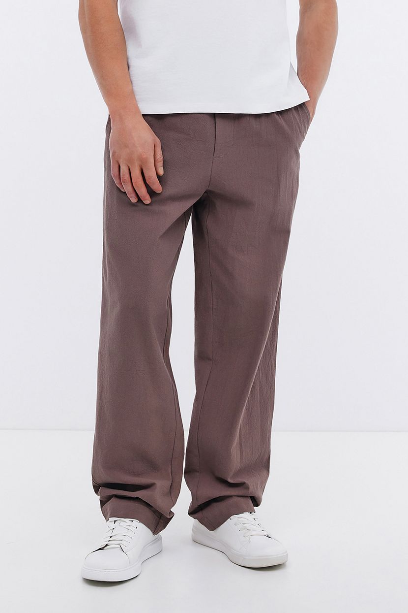 Брюки джоггеры из хлопка с мятым эффектом L коричневый 4799₽